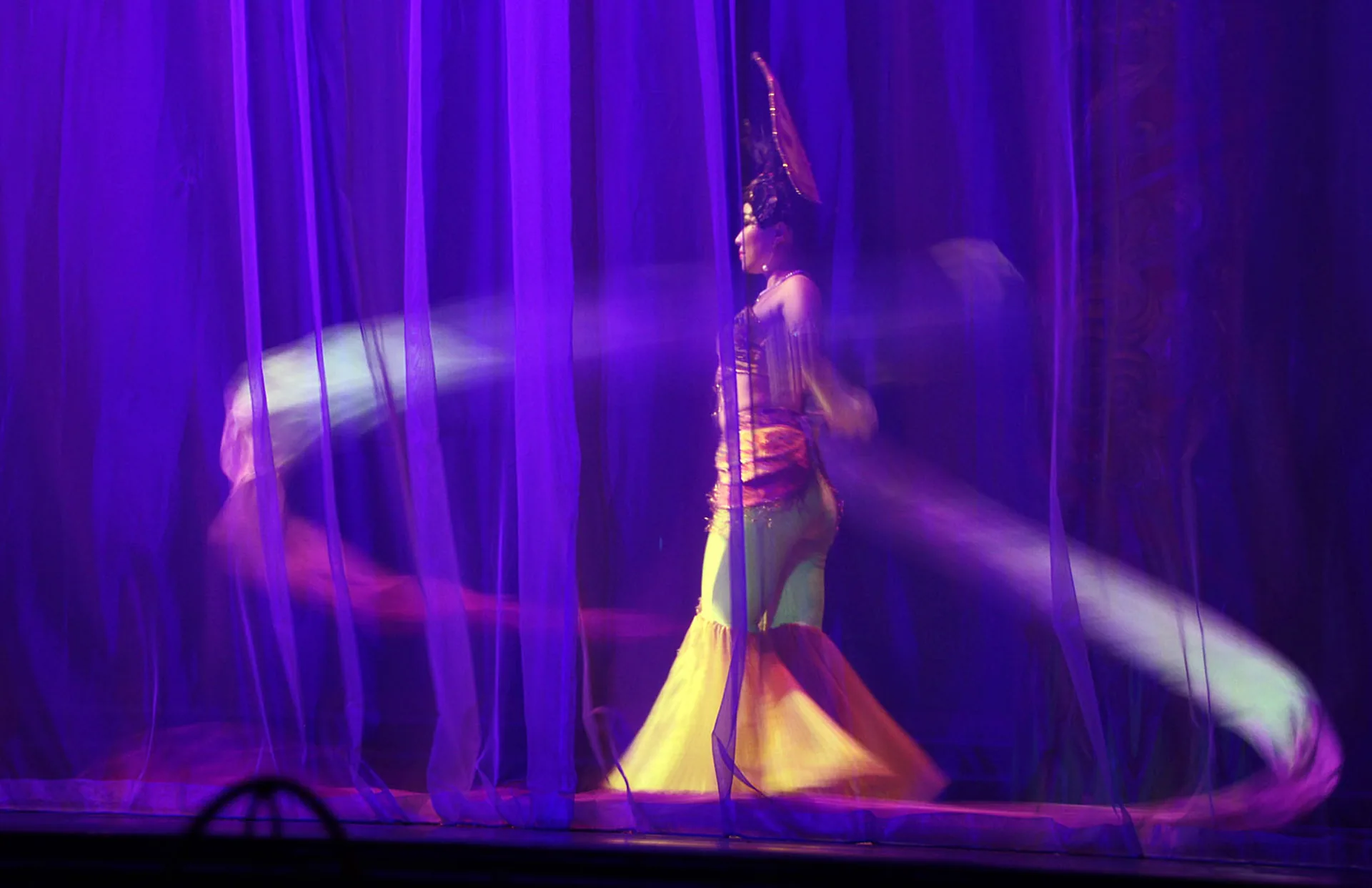 Costumed dancers of the Tang Dynasty Show performing a court dance in silk robes, Xi'an